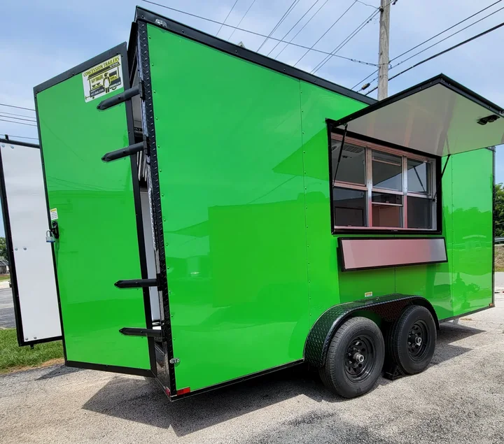 Bright green custom BJP concession trailer with a serving window