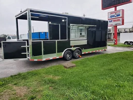 Black custom BJP concession trailer with porch and service window