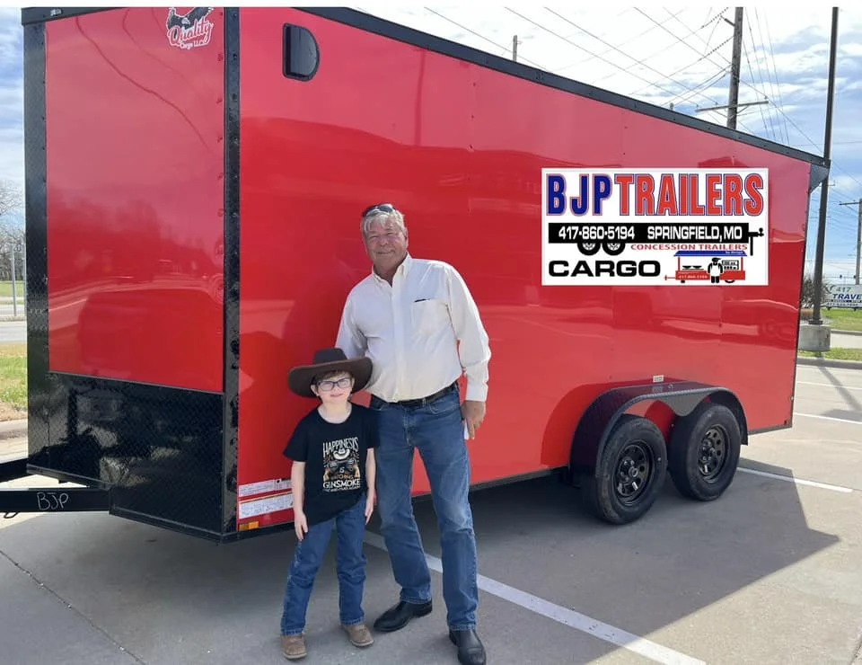 BJP Trailers founder Brad Petersen standing beside a red concession trailer in Springfield, Missouri