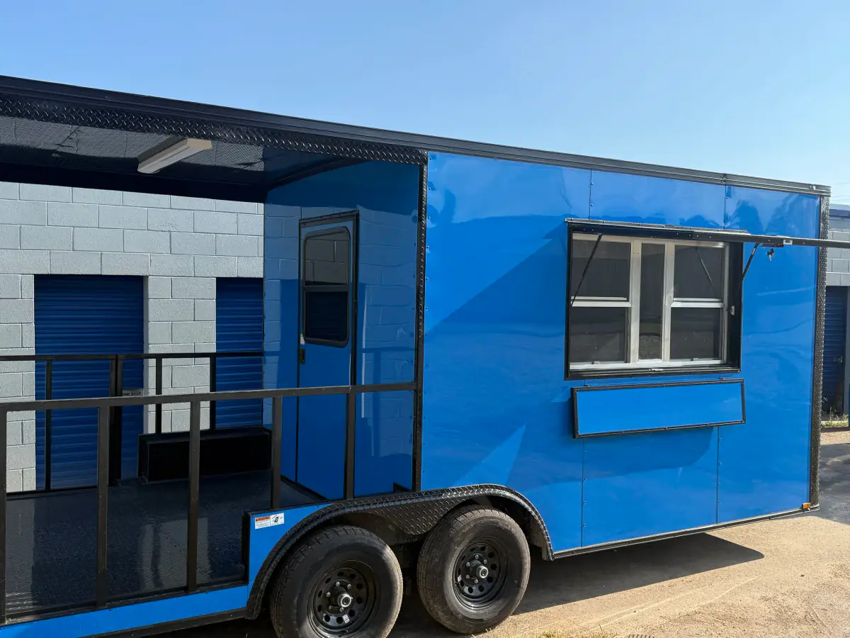 Blue BJP concession trailer with porch and serving window